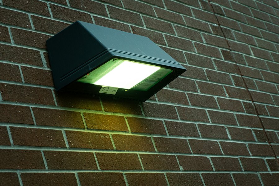 Waterproof outdoor light on a brick façade